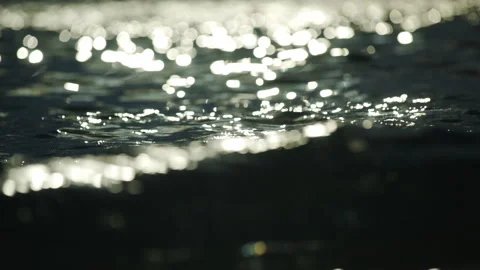 Sunrays on sea water Stock Footage 212693983