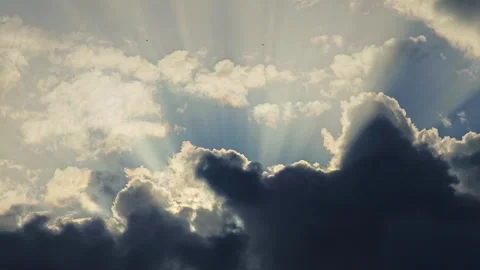 Sunrays shine through the clouds Stock Footage 278518454