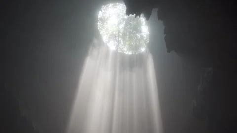 Sunrays Streaming Through Caves Of Goa Jomblang Stock Footage 146103907