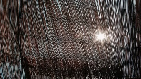 Sunrays through thatched roof. Vacation. Travel background. Stock Footage 254722580