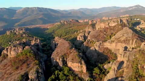 Sunrise above ancient rocks Stockbeeldmateriaal 148765003