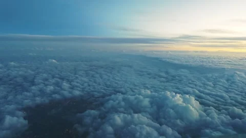 Sunrise Above Clouds clear sky with yellow hues Stock Footage 280094346