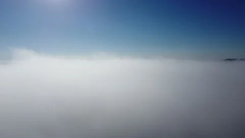 Sunrise above clouds from drone Stock Footage 219633955