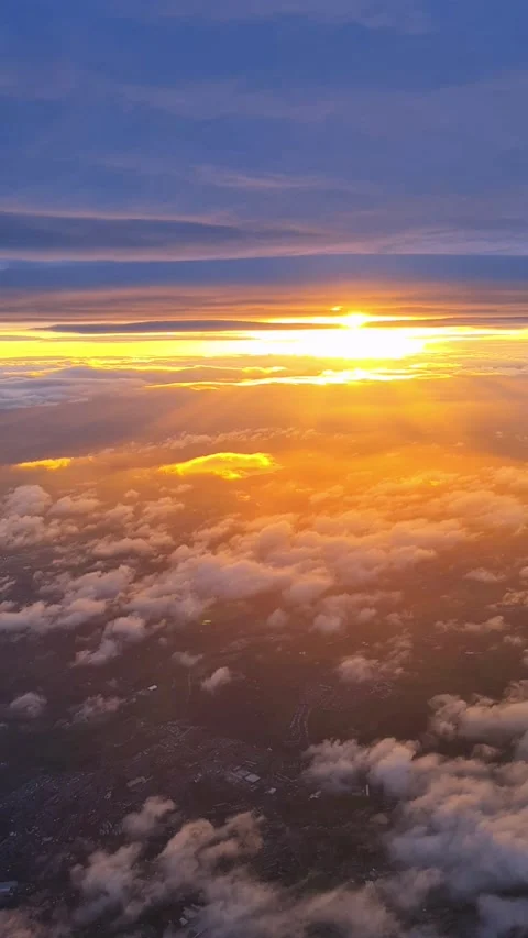 Sunrise Above the Clouds High in the Sky Stock Footage 281154689