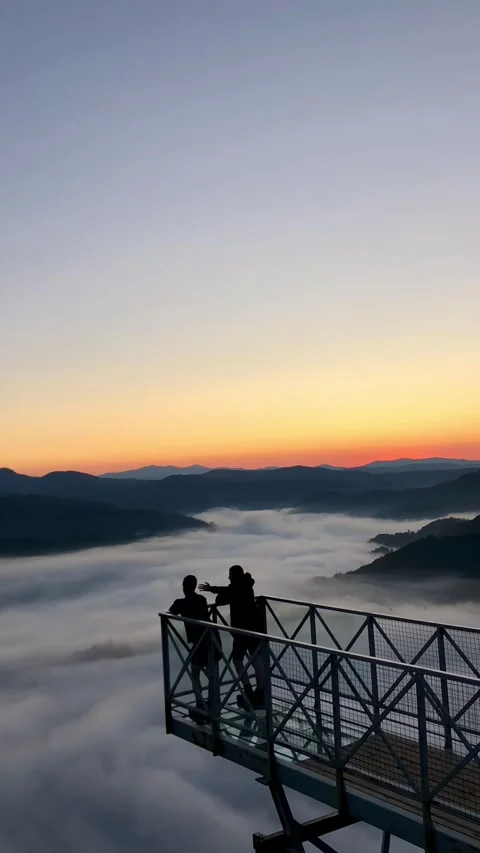 Sunrise Above Clouds in Mountain Valley from Scenic Viewpoint Video stock 325101906