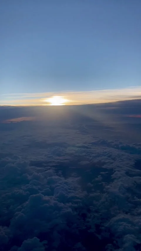 Sunrise Above the Clouds – A New Year in Flight, city view Stock Footage 313450349