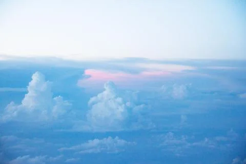 Sunrise above clouds Stock Photos