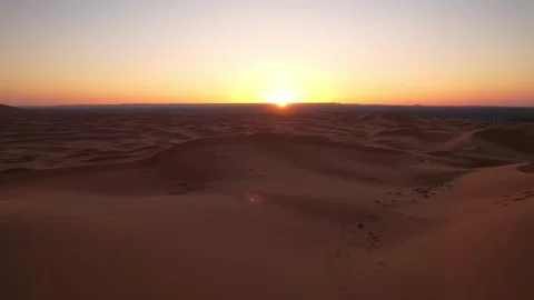Sunrise above the Erg Chebbi dune sea near Merzouga Morocco Stock Footage 338168768