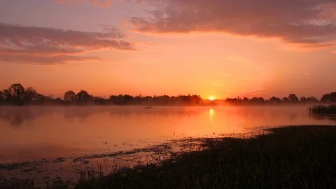 Sunrise above the pond with cloudy sky at summer. Stock Footage 108858599