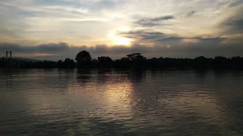 Sunrise above the river Stock Footage 134943501