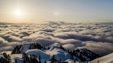 Sunrise Above a Rolling Sea of Clouds Stock Footage 73219957