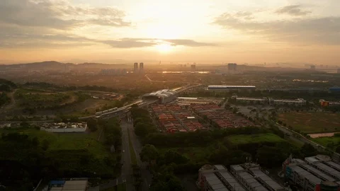 Sunrise aerial view hyper lapse of Light Rail Transit (LRT) station Vídeo Stock 101692529