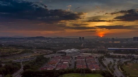 Sunrise aerial view hyper lapse of Light Rail Transit (LRT) station 스톡 동영상 101693094