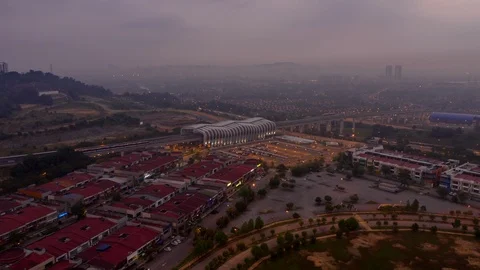 Sunrise aerial view hyper lapse of Light Rail Transit (LRT) station Video stock 101693341