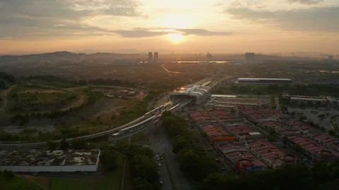 Sunrise aerial view hyper lapse of Light Rail Transit (LRT) station 库存影片 101693645