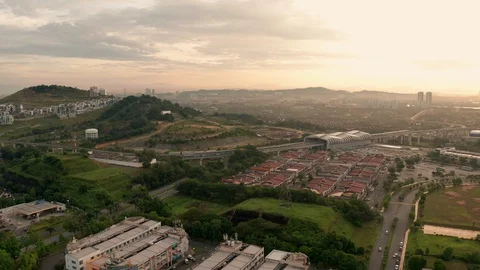 Sunrise aerial view hyper lapse of Light Rail Transit (LRT) station Stock Footage 101694909