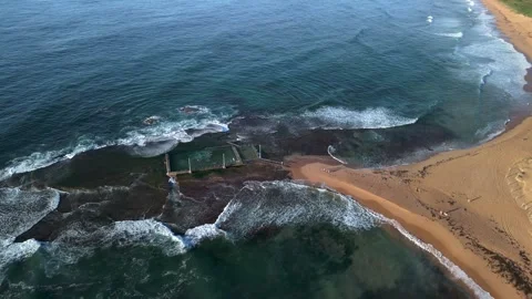 Sunrise Aerial View of Mona Vale Beach, Rockpool &amp; Cliffs, Sydney, Australia 38 Stock Footage 307824341