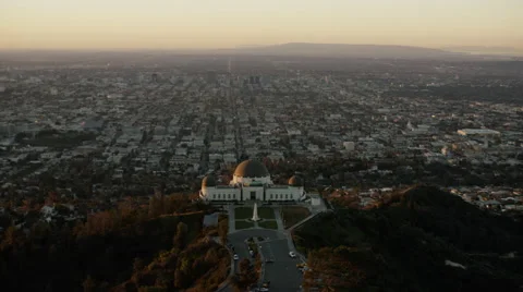 Sunrise aerial view over Griffith Observatory Los Angeles California Stock Footage