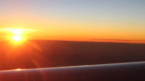 Sunrise from an aeroplane window Stock Footage 37347644