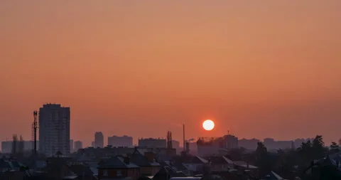 Sunrise against the backdrop of the cityscape Stock Footage 105791529
