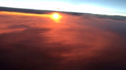 Sunrise airborne time lapse shot at 35,000 feet 動画素材 72627853