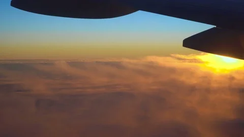 Sunrise in the airplane Stock Footage 72529823