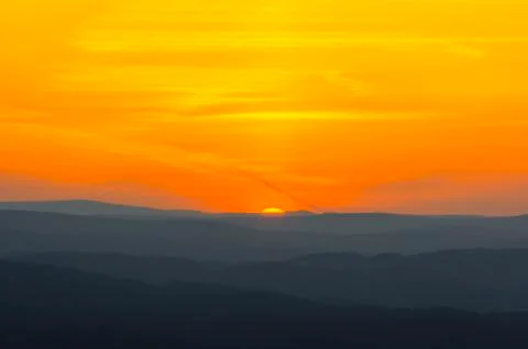 Sunrise and clouds Stock Photos