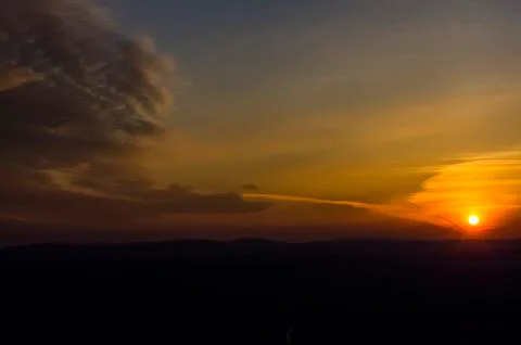 Sunrise and clouds Stock Photos