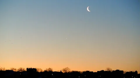 Sunrise and moon on the sky at the same time Stock Footage 36642916