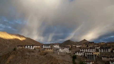 Sunrise and moring clouds over the Kibber village in Spiti Valley - Timelapse Stock Footage 75561295