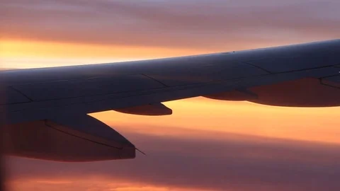 Sunrise and pink clouds, shot from a plane. Stock Footage 80563131