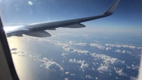 Sunrise and pink clouds, shot from a plane. Stock Footage 80563186