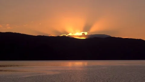 Sunrise and slanting rays of light on Lake Toya, Hokkaido Stock Footage 270147435