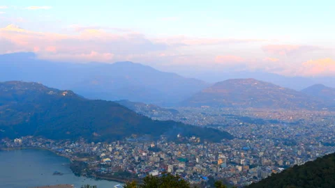 Sunrise and Sunset Timelapse over the Himalayas from Pokhara, Nepal Stockbeeldmateriaal 343719419