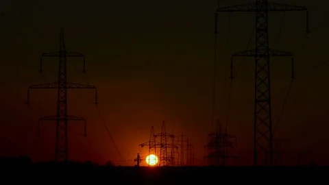 Sunrise on a background of a high-voltage line Stock Footage 78603108