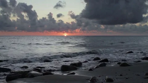 Sunrise on the beach. Beautiful clouds and surf. (speeded up 300%) 스톡 동영상 70819736