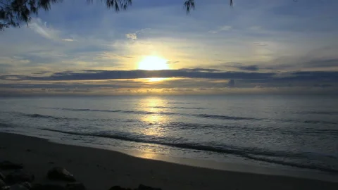 Sunrise on the beach on a cloudy day. Stock Footage 154879172