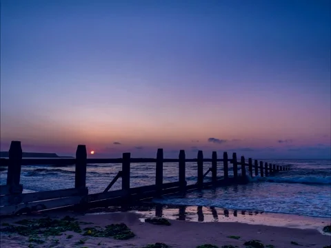 Sunrise on the beach at DAWLISH WARREN in Devon in England Stock Footage 141486328