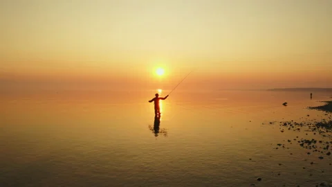 Sunrise beach fishing drone silhouette Stock Footage