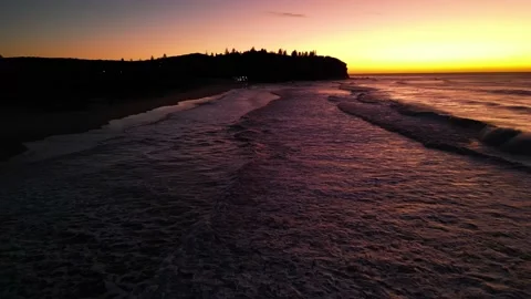 Sunrise beach flyover Stock Footage 209875732