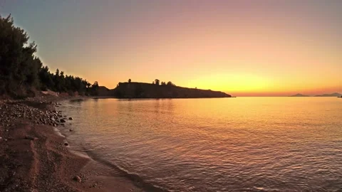 The sunrise at the beach Kokkinokastro of Alonissos island, Greece Stock Footage