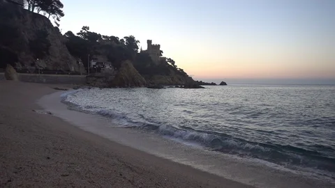 Sunrise on the beach of Lloret de Mar Stock Footage 111256846