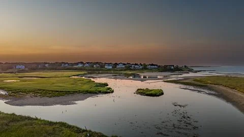 Sunrise on Beach with Marsh Foto stock