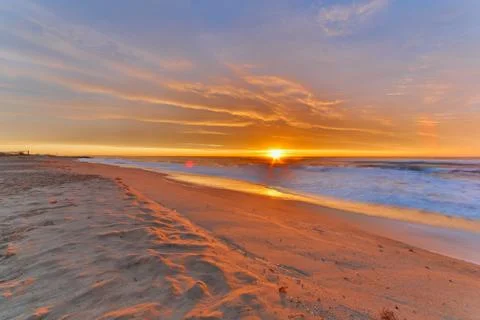 Sunrise beach Stock-Fotos