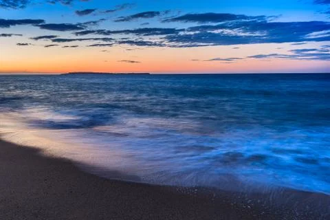 Sunrise beach Stock Photos