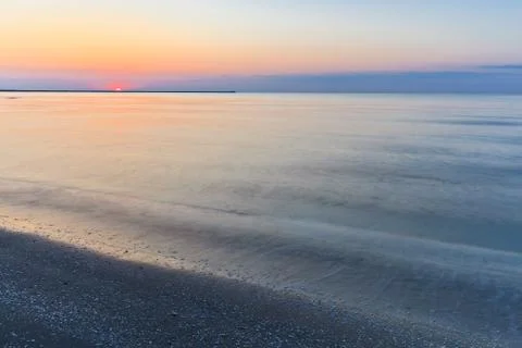 Sunrise on the beach Stock Photos