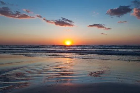 Sunrise on the beach Stock Photos