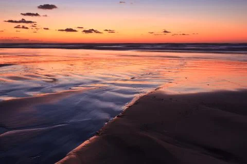Sunrise beach Stock Photos
