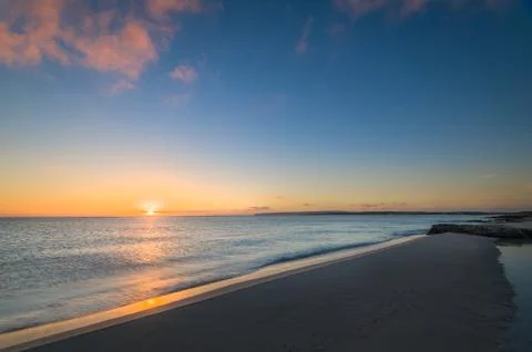 Sunrise on the beach Stock Photos