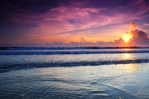 Sunrise at the beach Stock Photos